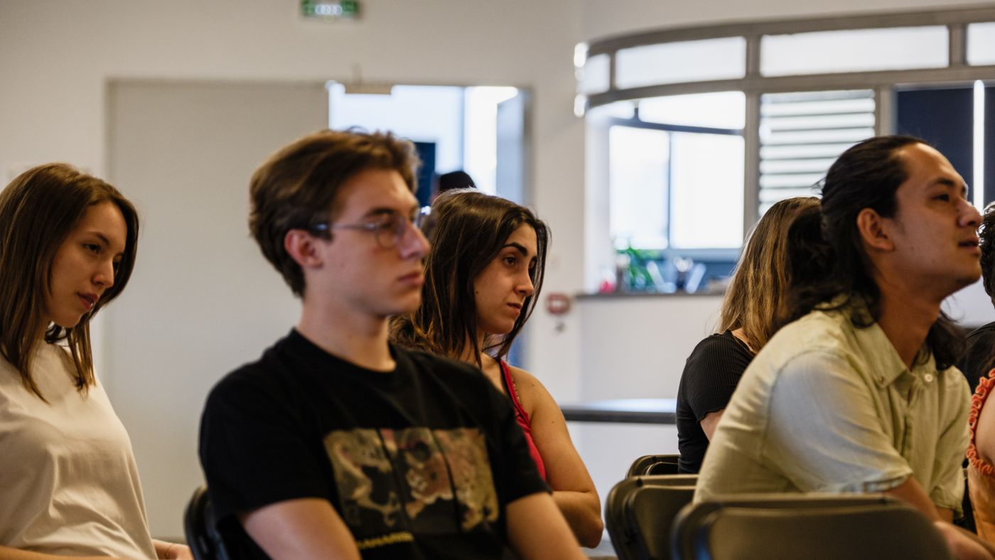 An audience during a live session on the A³ campus